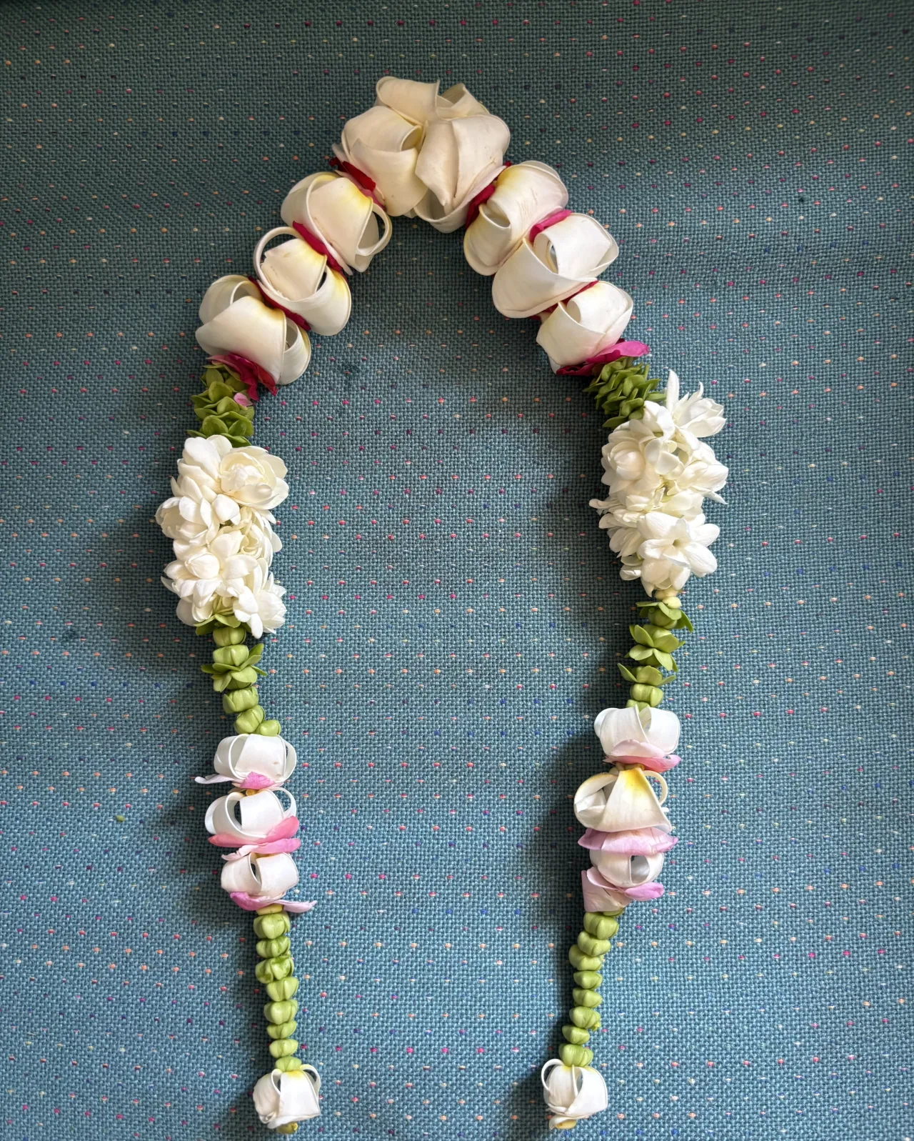 fresh jasmine mala (garland) is a beautiful, traditional art used for temple offerings, bridal wear, and festive decorations