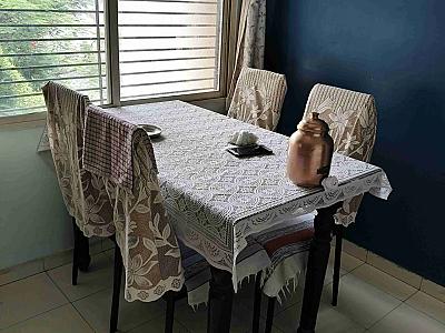 4  seater dining table with sag wooden