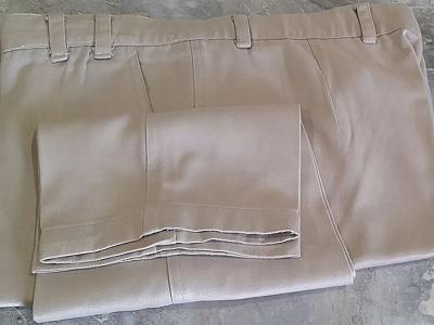 7 Men's used formal pants.