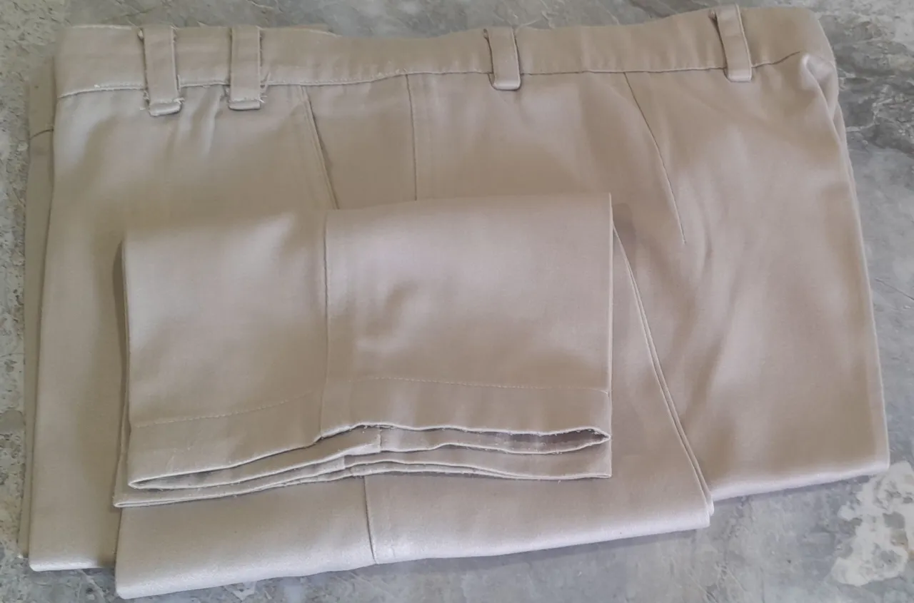 7 Men's used formal pants.