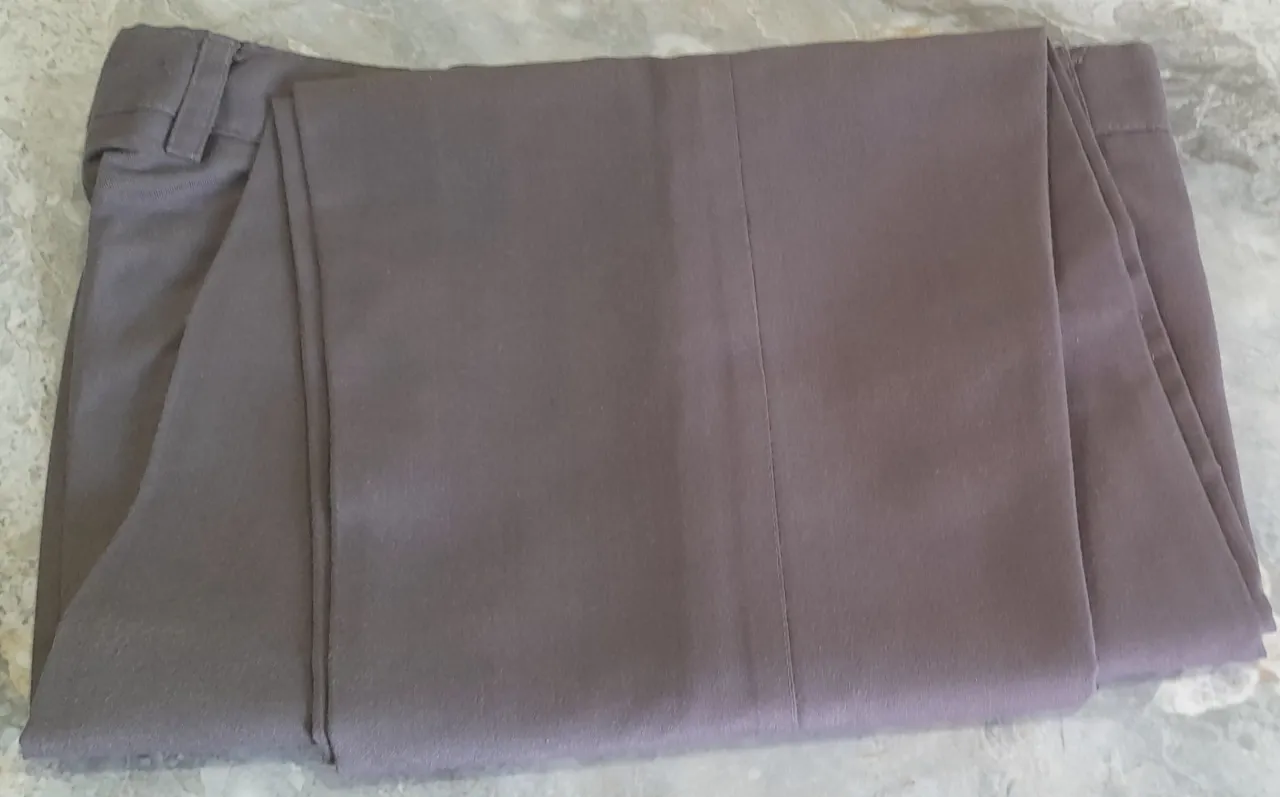 7 Men's used formal pants.