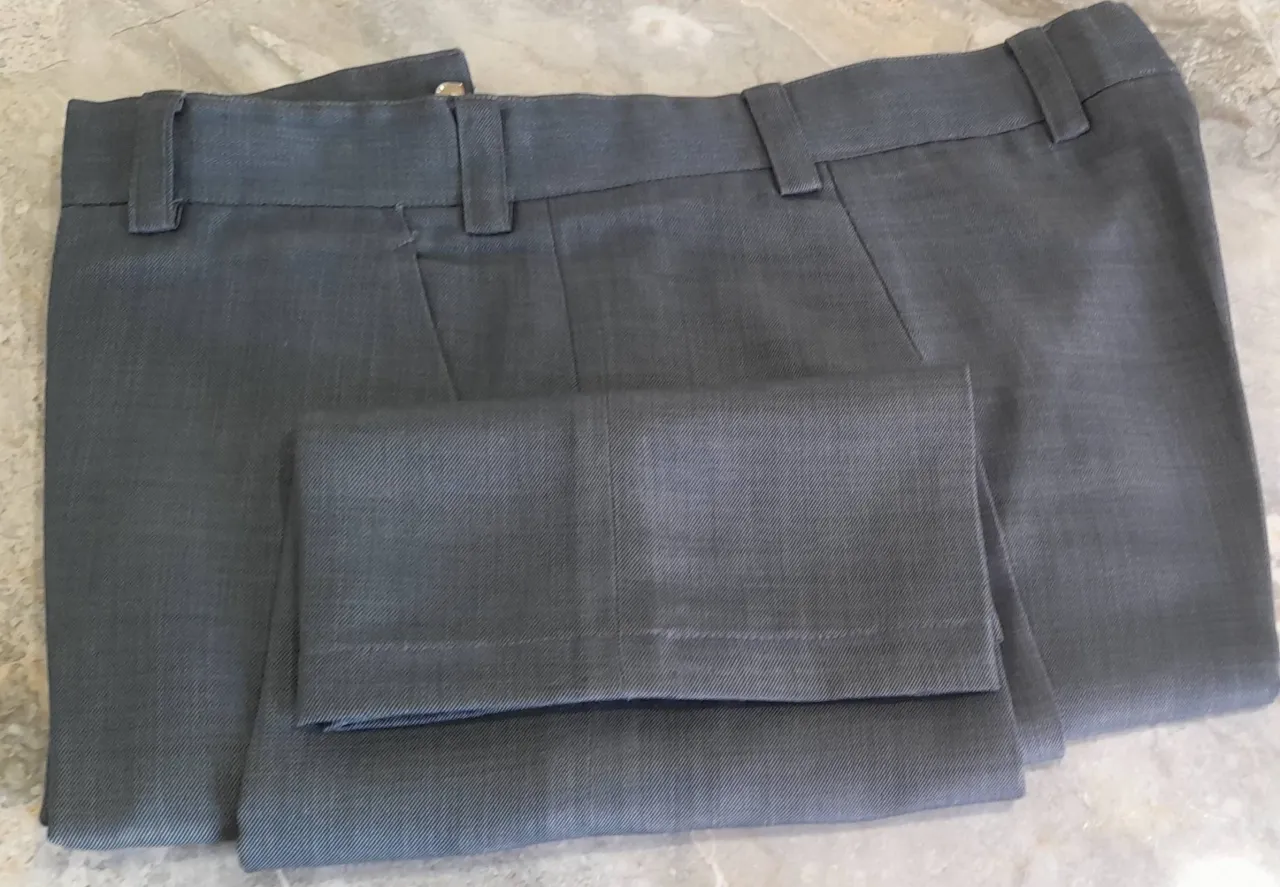 7 Men's used formal pants.