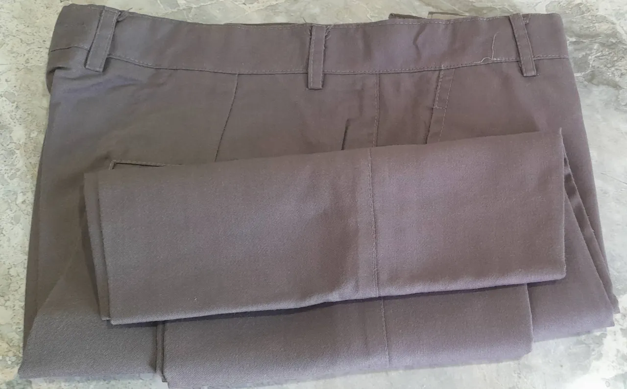 7 Men's used formal pants.