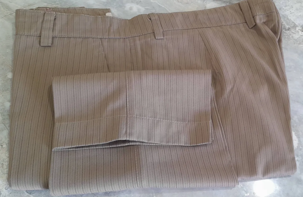 7 Men's used formal pants.