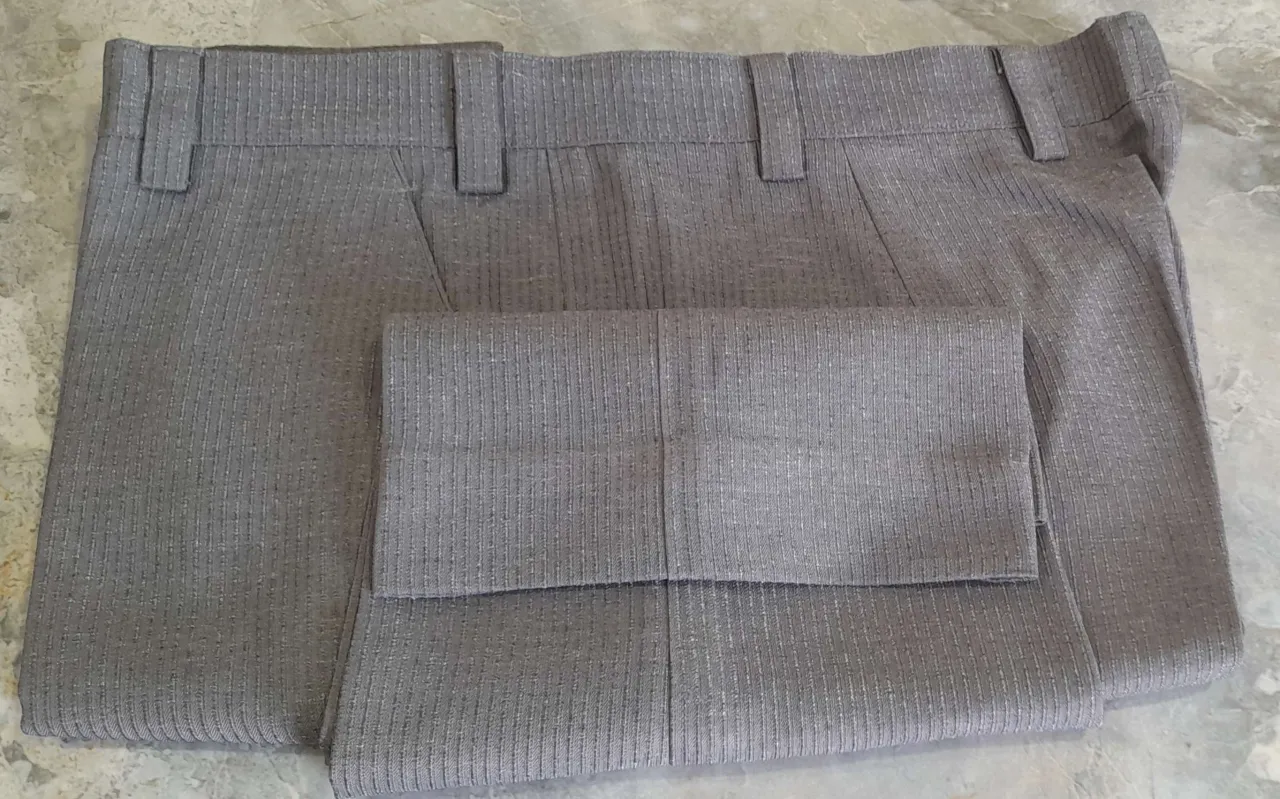 7 Men's used formal pants.